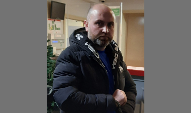 Abwbaker in handcuffs